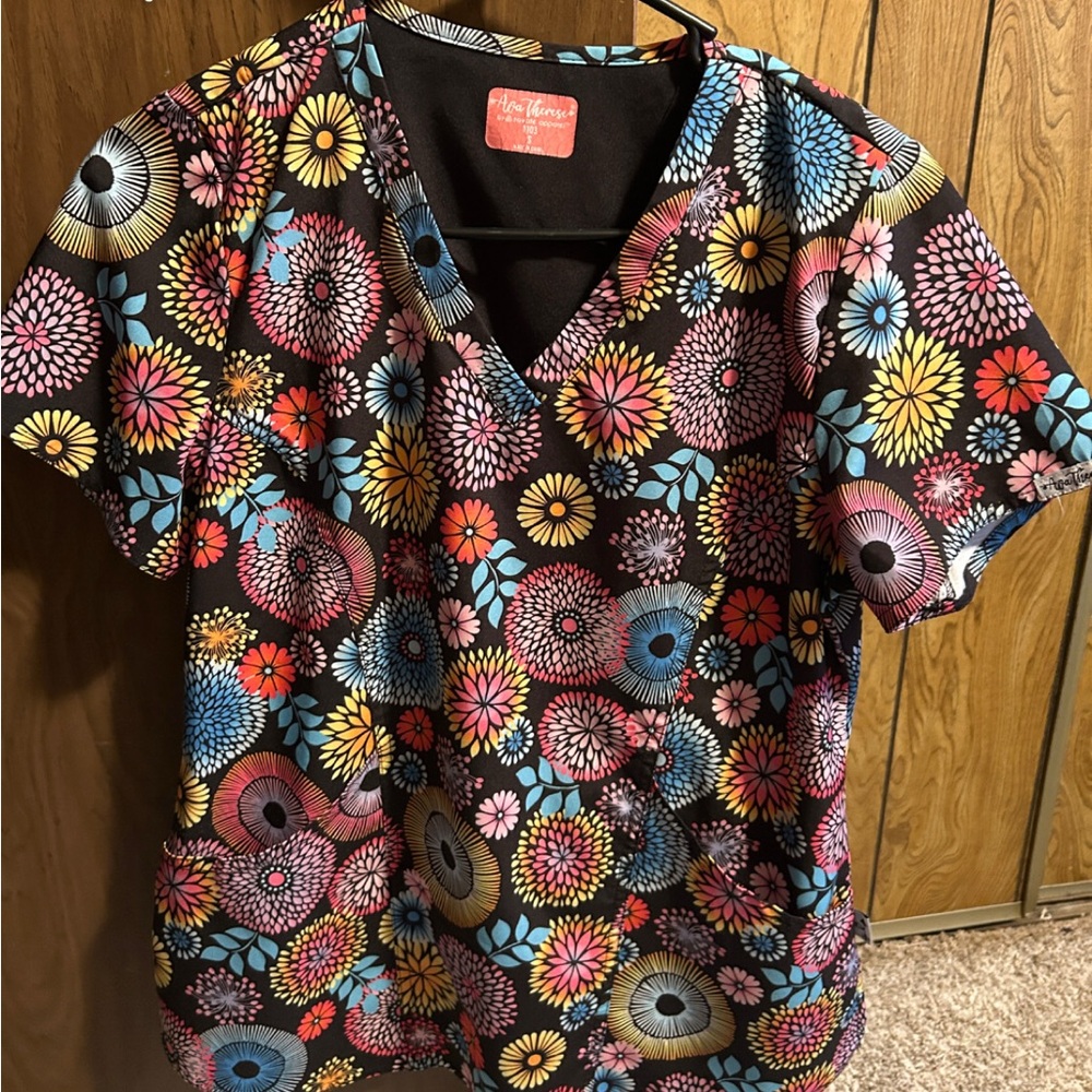 Name brand scrub tops size xs, small, medium 
*$25 a top*